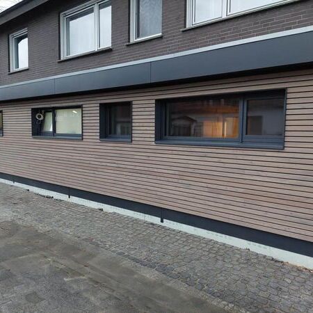 Fassade aus Lärche und mit Vergrauungslasur